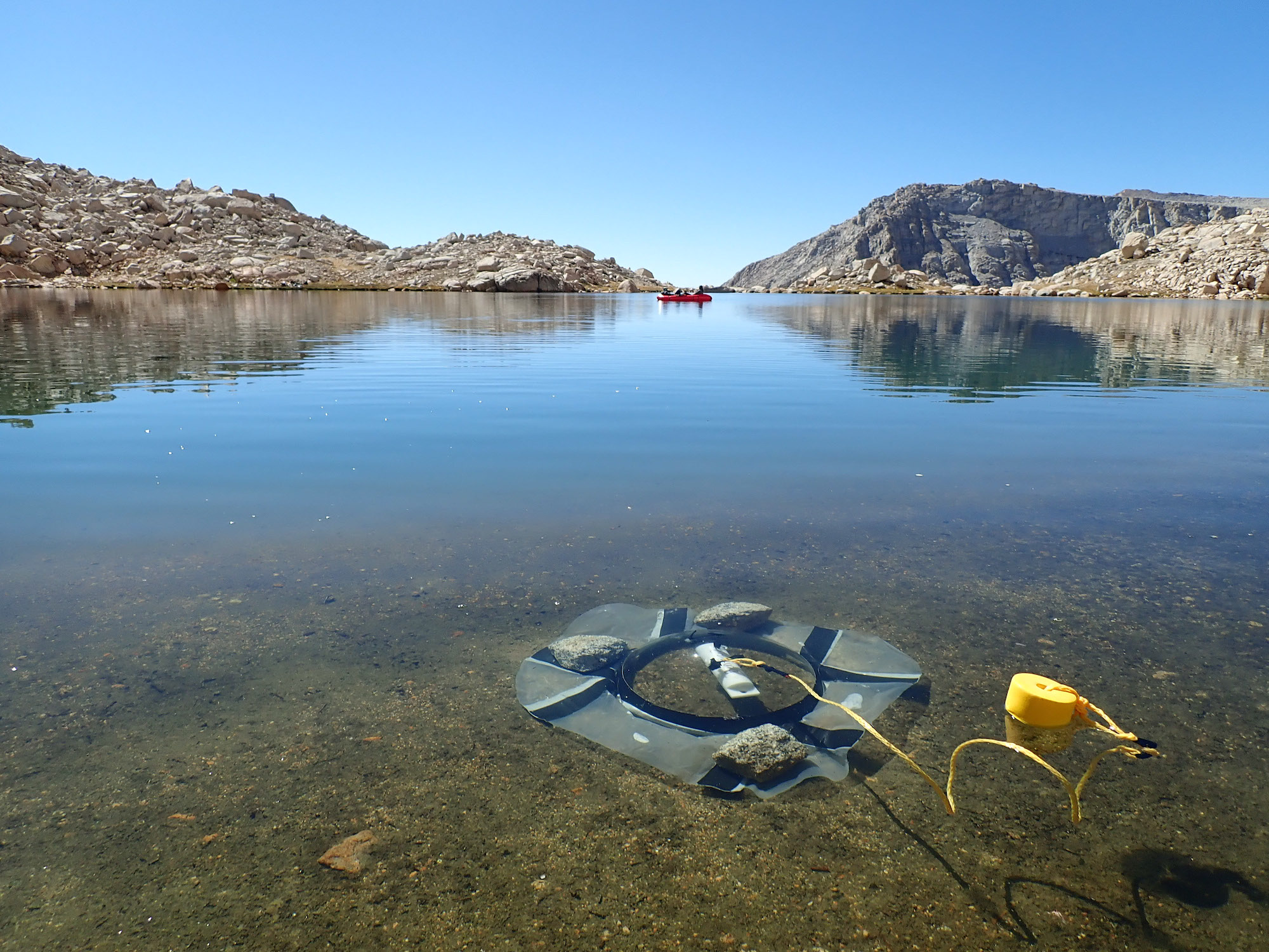 Benthic chambers measure sediment metabolism at a small Sierra Nevada lake in August 2018. (E. Suenaga)