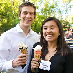 Two students at a scholarship event enjoying ice cream.