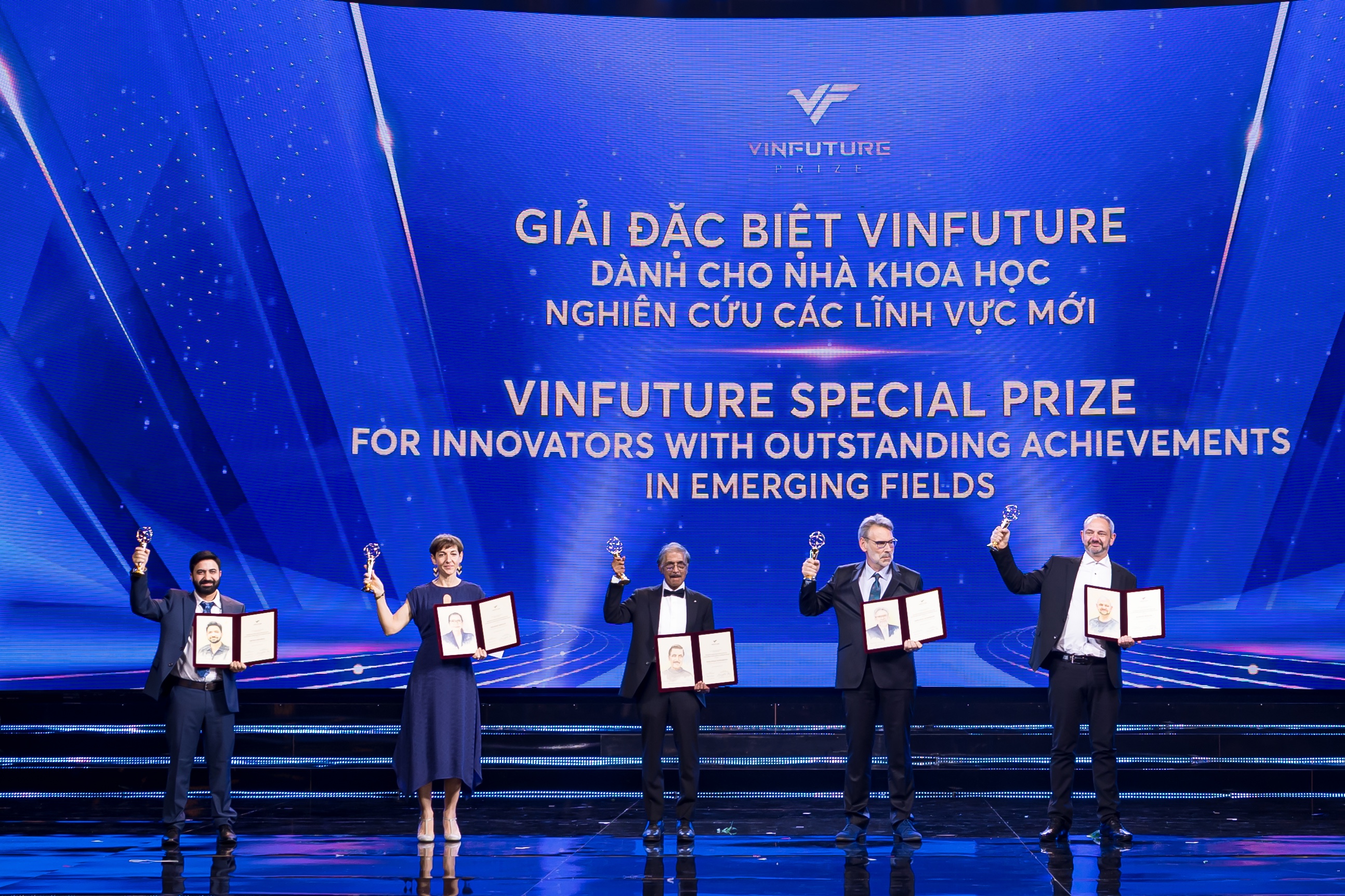 People on a stage after winning a VinFuture prize