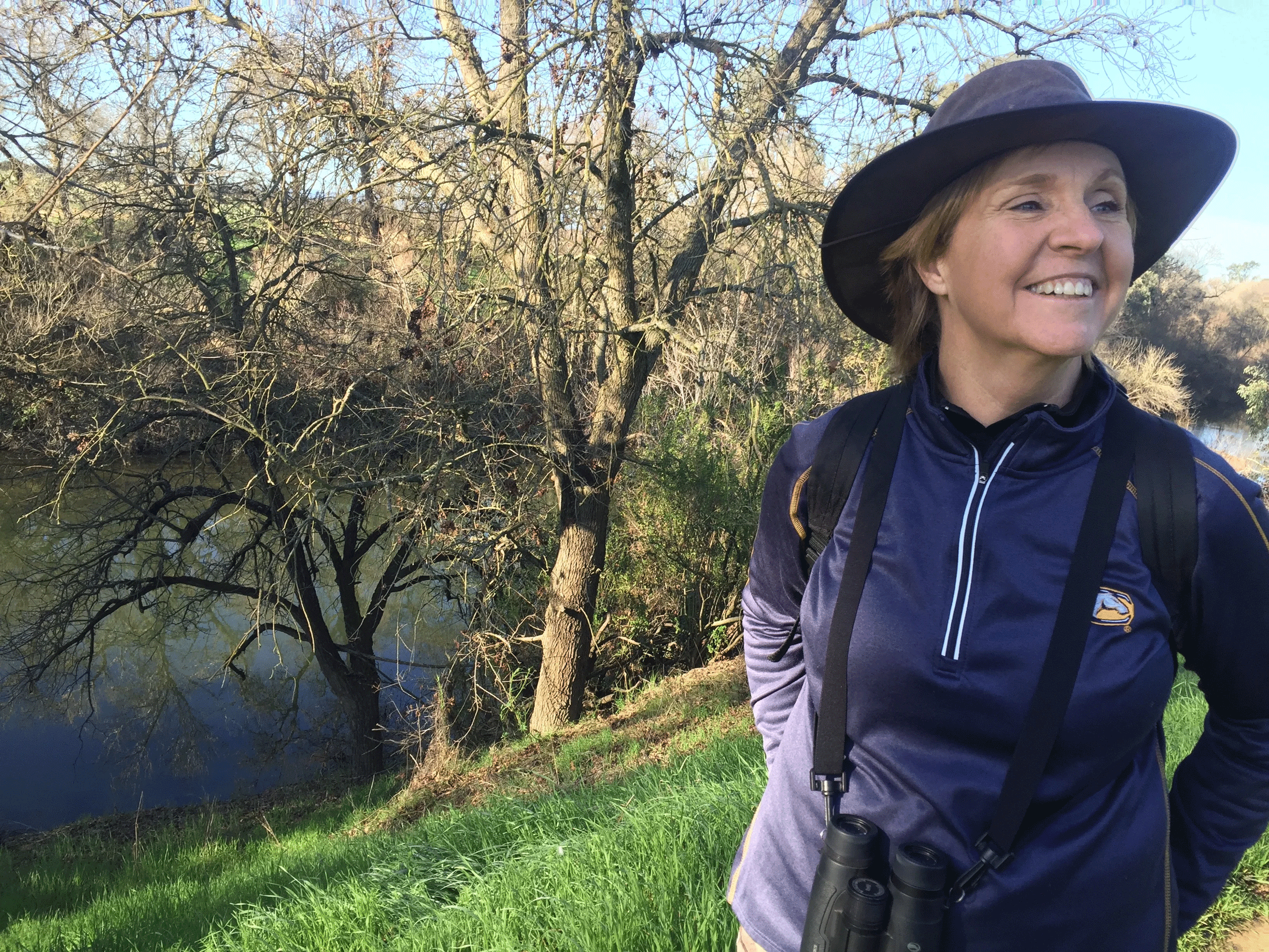 Melanie Truan, research ecologist and Nestbox Highway founder, smiles on the trail at Putah Creek in 2018. (Kat Kerlin, UC Davis)