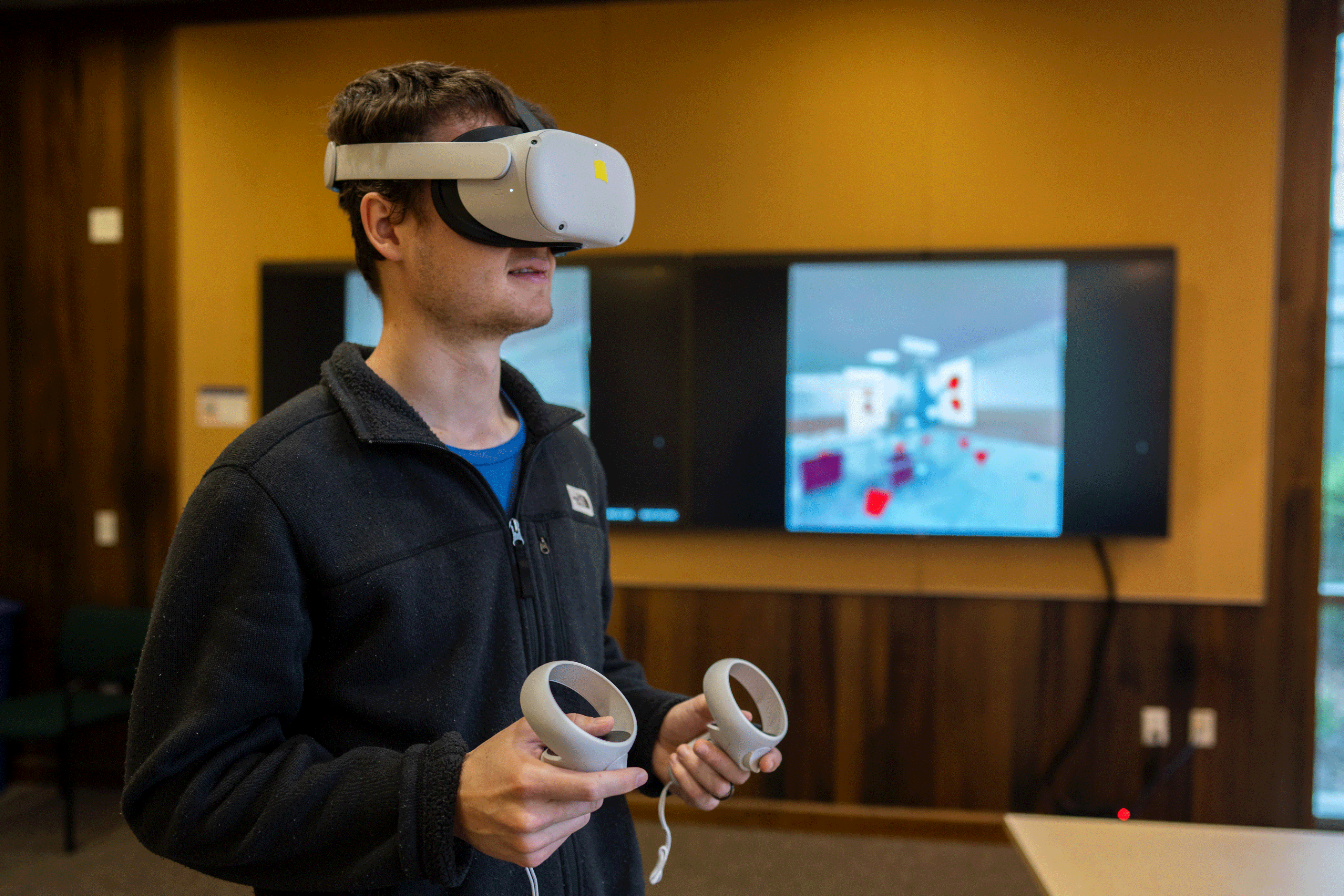 Shayne Morrissey, Ph.D. student and teaching assistant with the Department of Food Science and Technology, demonstrates virtual environment featuring a steam jacketed kettle. Photo by: Jael Mackendorf, UC Davis