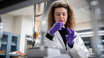 Allison Ehrlich, assistant professor in the Department of Environmental Toxicology, works in her lab March 17. She studies potential links between diet, microbiome, chemical contaminants, drugs and other environmental factors associated with immune-mediated diseases such as diabetes.  