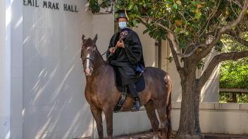 Animal science professor Russ Hovey led a virtual faculty procession for the June 2020 graduating class in a most unusual way. 