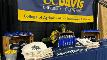 The UC Davis CA&ES booth is ready to to welcome prospective students, alumni and guests. 