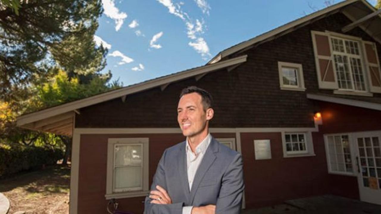 Ben Houlton, director of the John Muir Institute of the Environment, stands outside The Barn, a renovated cattle barn at UC Davis that houses the administrative offices for the JMIE and several other programs. (Karin Higgins/UC Davis)