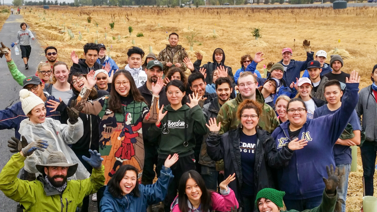 A group of 21 CAES students, joined by staff from the dean’s office, recently spent a Saturday helping plant more than 300 trees and shrubs with the Sacramento Tree Foundation at the Bear River Habitat trail in Yuba County.