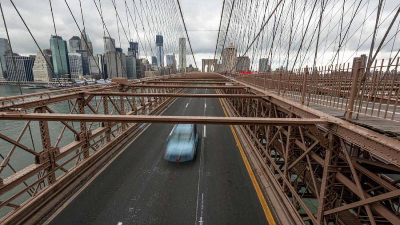One car drives across New York’s Brooklyn Bridge during this spring’s shelter-in-place directives. (Getty)