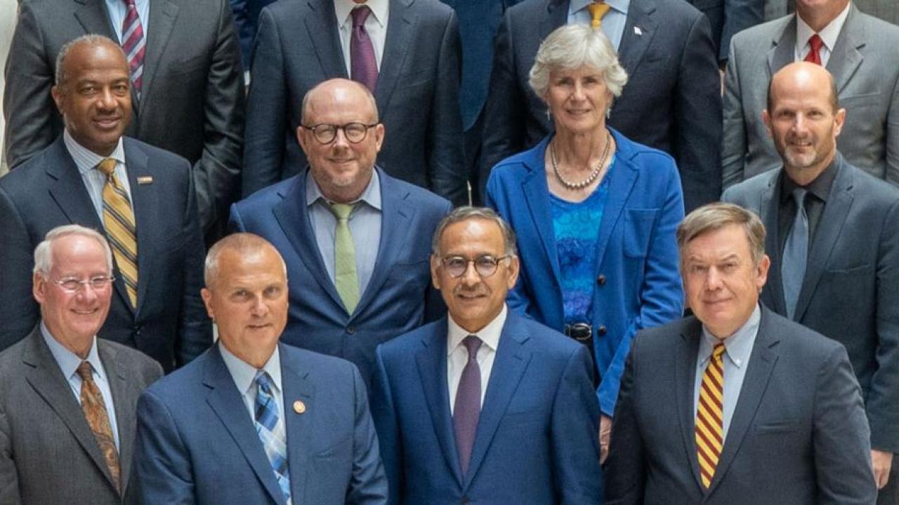 Chancellor May, top left, in group photo at Aug. 7 launch of the National Commission on Innovation and Competitiveness Frontiers. (Courtesy Council on Competitiveness)
