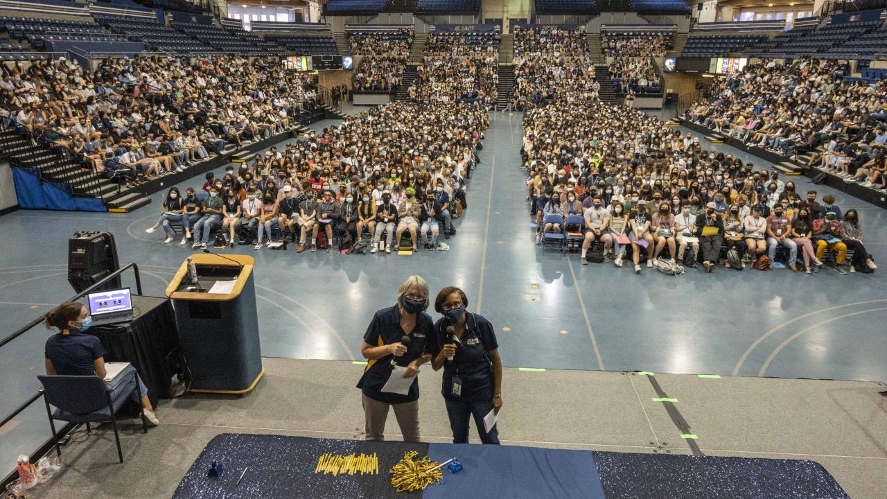 Dean Dillard and Associate Dean Sue Ebeler pose for a selfie with incoming freshman and transfer students at the College of Agricultural and Environmental Sciences welcome event on Friday, September 17, 2021 at the UC Davis U Center.