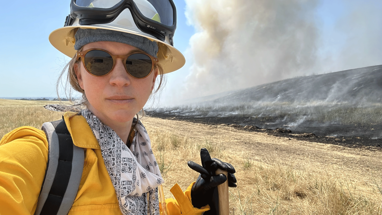 Emily Schlickman at a prescribed burn in Yolo County, June 2023. Photo by: Emily Schlickman/UC Davis