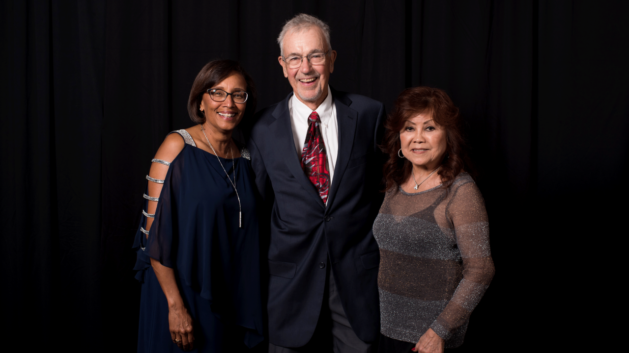 Dean Helene Dillard, James Seiber and Rita Seiber at the Award of Distinction ceremony in 2018.