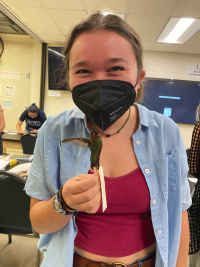 UC Davis student Malia Reiss with an Anna's hummingbird specimen.(Courtesy Malia Reiss, UC Davis)