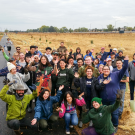 A group of 21 CAES students, joined by staff from the dean’s office, recently spent a Saturday helping plant more than 300 trees and shrubs with the Sacramento Tree Foundation at the Bear River Habitat trail in Yuba County.