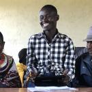 MRR research team member Benjamin Ltarapua Lolmingani (center) facilitates a game of SimPastoralist in northern Kenya