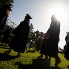 Graduates enter during the College of Agricultural and Environmental Sciences graduation ceremonies.