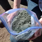 UC Davis researchers find adding crushed volcanic rock to farmlands can remove carbon dioxide from the air. This 'enhanced' rock weathering works even in dry climates. (Amy Quinton/UC Davis)
