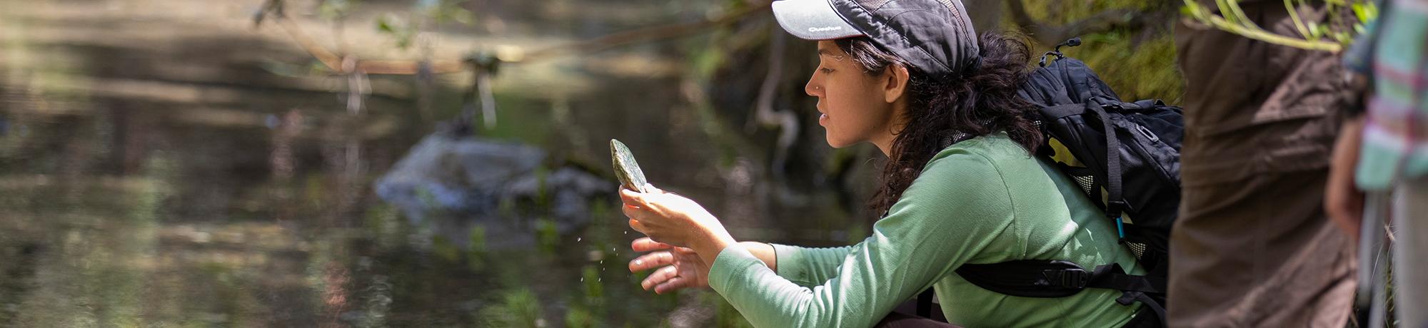 A group of students went down to the Parson's Creek tributary to the Russian River that runs alongside the UC Hopland Research and Extension Center to practice taking measurements of the water.